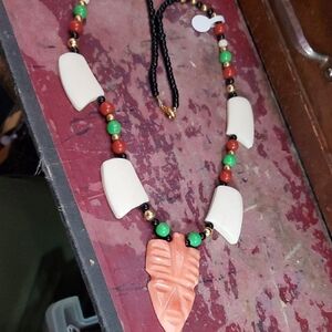 Multicolor Beaded Necklace with arrowhead/face Pendant